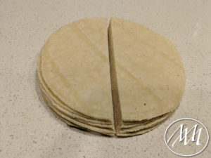 Tortillas cut in half for chips