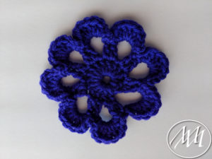 Finished crochet flower with 8 eight petals