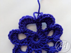 Crochet flower tie a knot