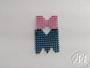 Plastic Canvas Bow and M Initial Connected