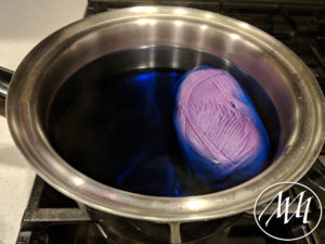 Yarn is finished coloring in pot
