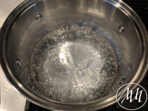 Boiling water in pot for chicken