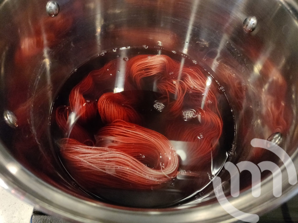 Yarn in dye pot