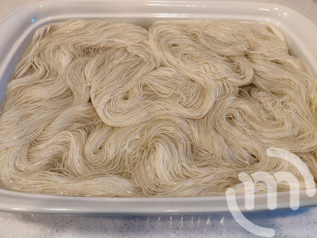 Pre-soaking yarn in caserole dish and tap water