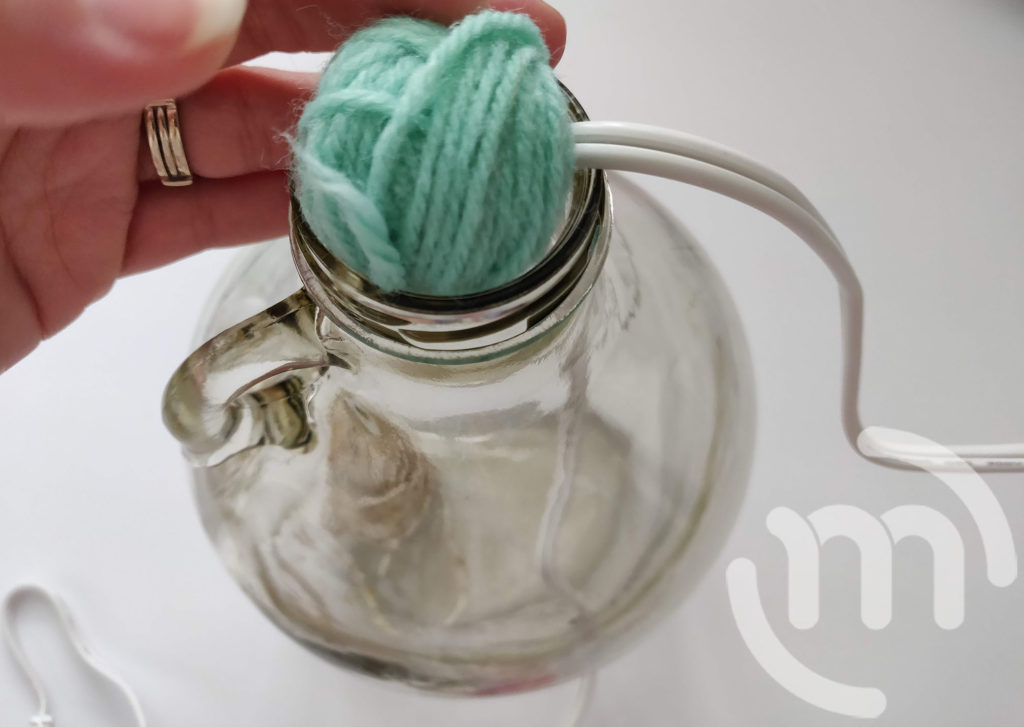 Adding yarn to bottle