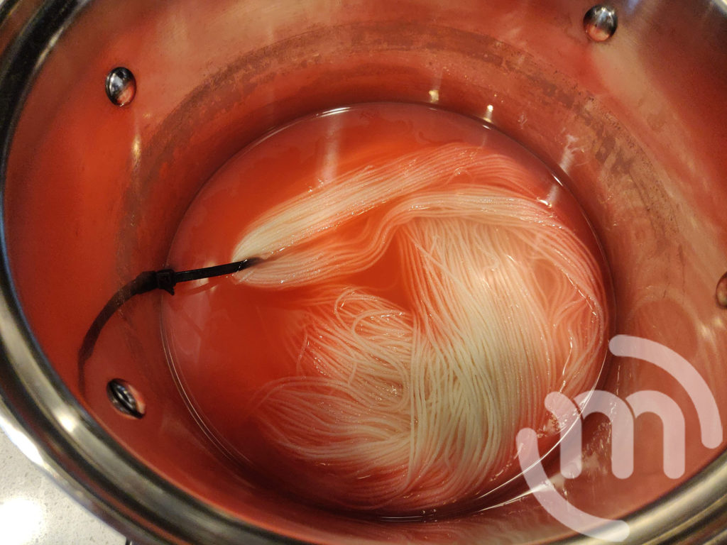 Pink Lemonade yarn in dye pot